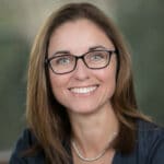 head shot of lady with glasses
